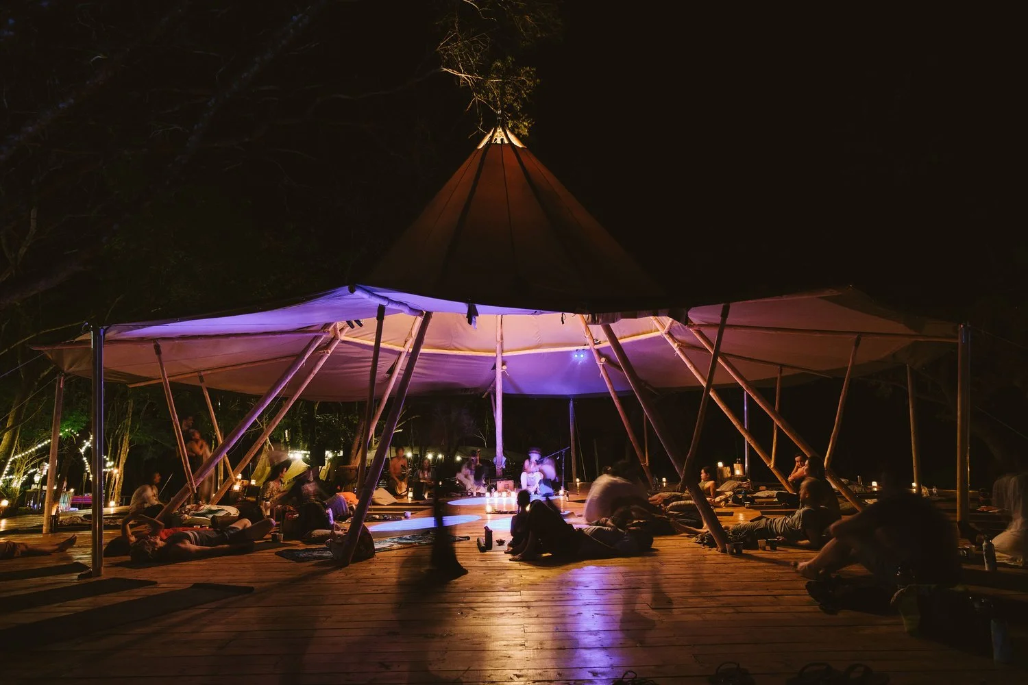 Evening gathering in an open-air pavilion