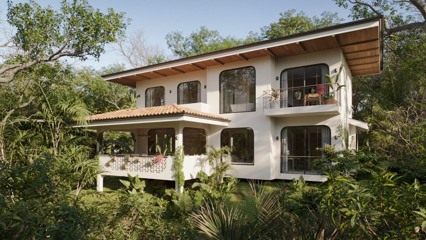 Villa Luma rear elevation with deep overhangs and steel-frame glass